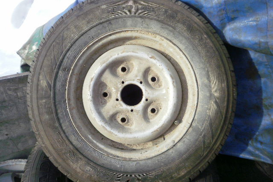 Подержанный легкосплавный диск+летняя шина 185R14,