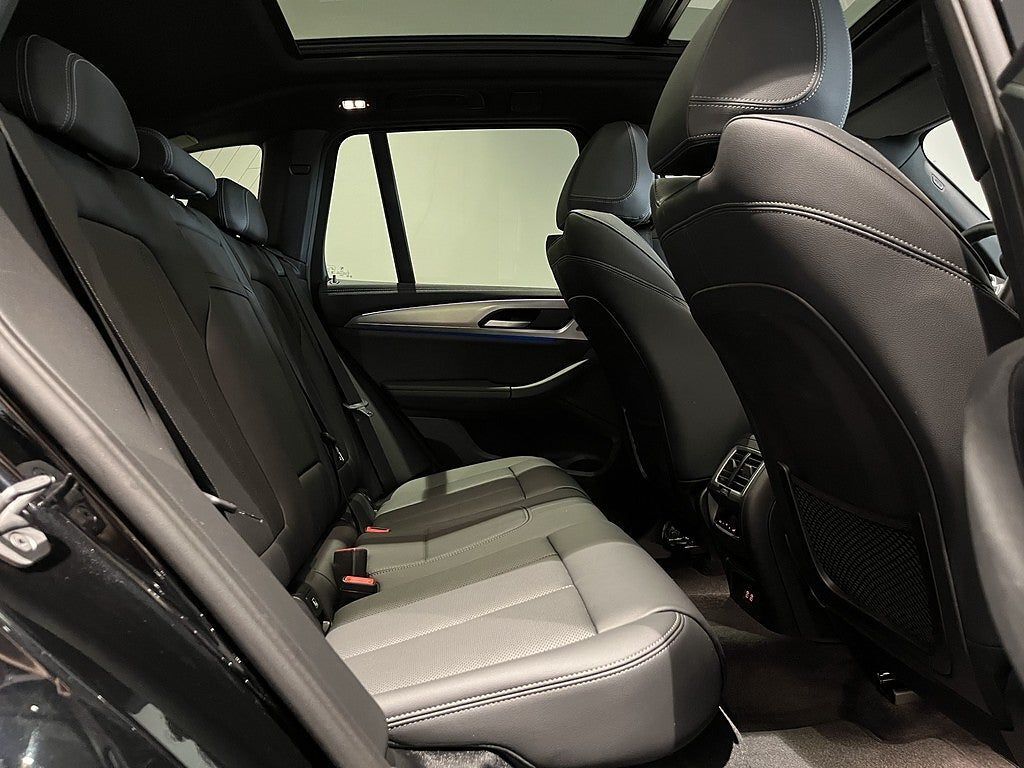 BMW iX3 2024, photo 7/34