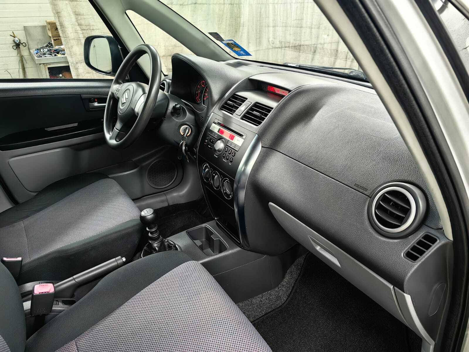 Suzuki SX4 1.9 88kW 2008, photo 4/15