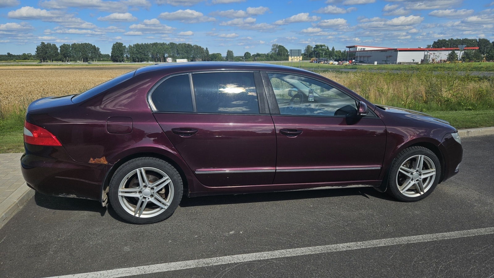 Škoda Superb 2012, photo 4/10