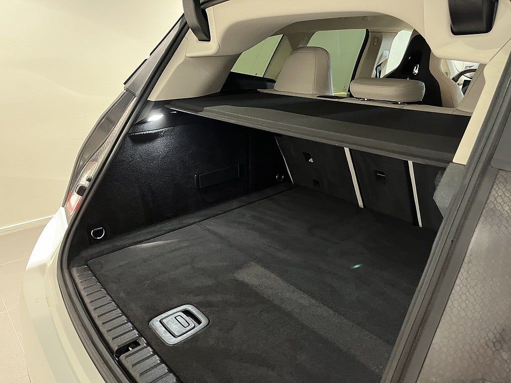 BMW iX 2024, photo 6/10