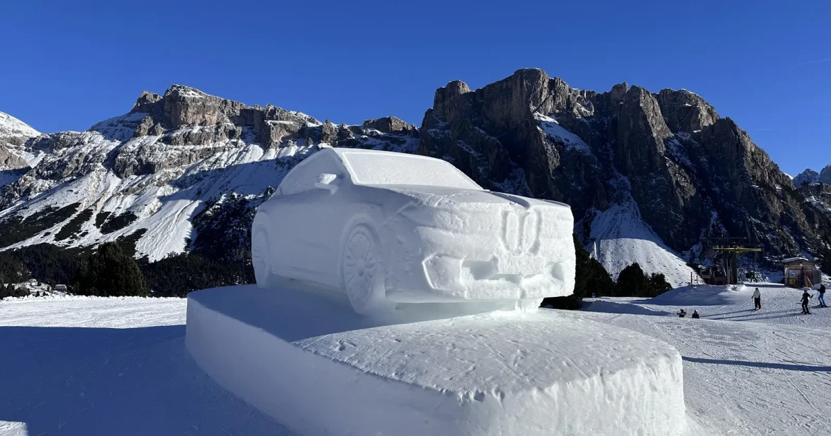 Snow car sculpture symbolising the frozen used car market in Estonia